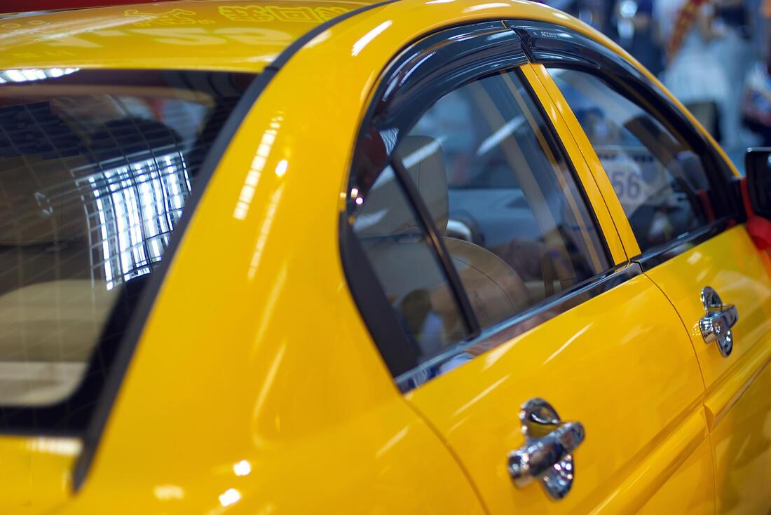 yellow car with windows tint